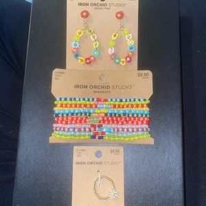 BRAND NEW 2 set pieces of Jewelry. 12 pc Bracelets, and Ring. NO longer earring